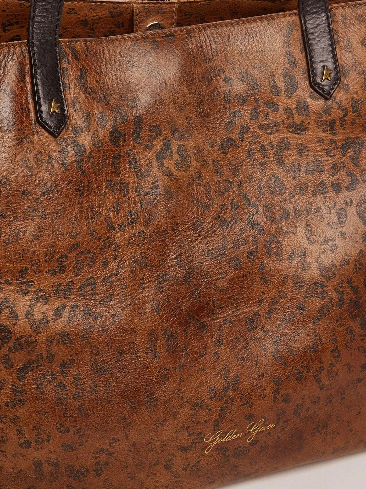 Pasadena Bag in hammered leather with leopard print and contrasting black handles