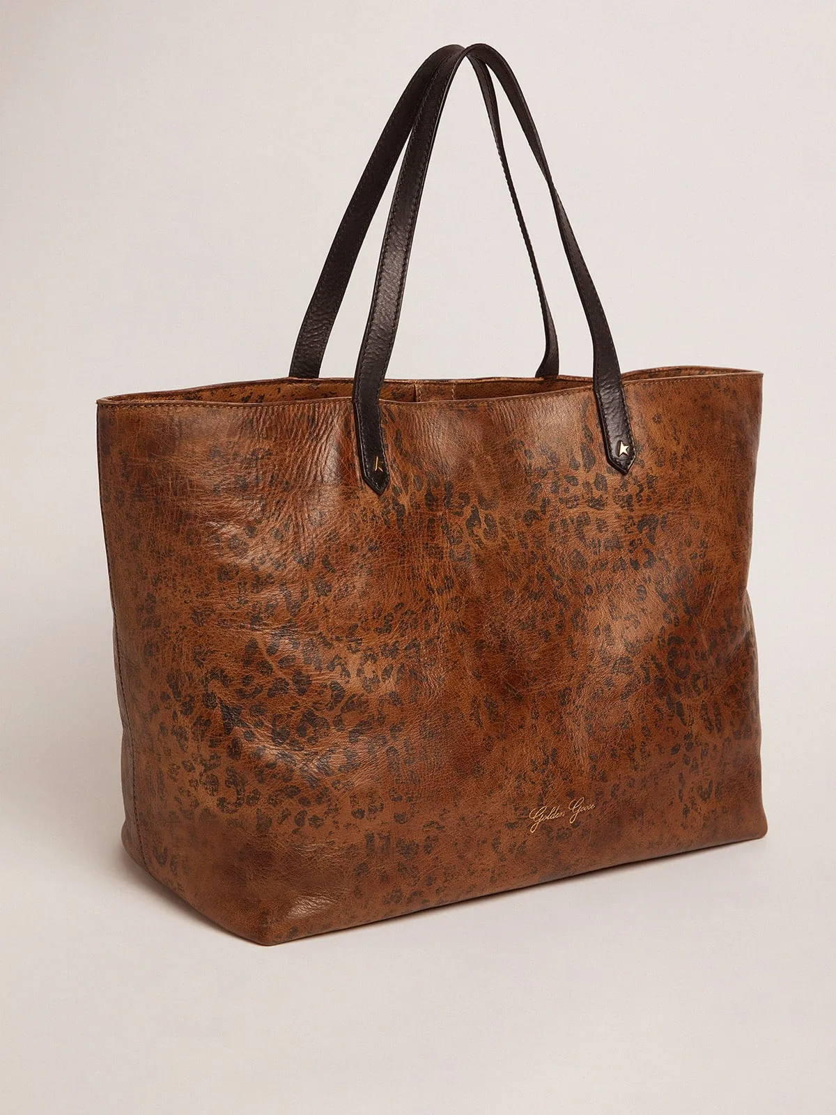 Pasadena Bag in hammered leather with leopard print and contrasting black handles